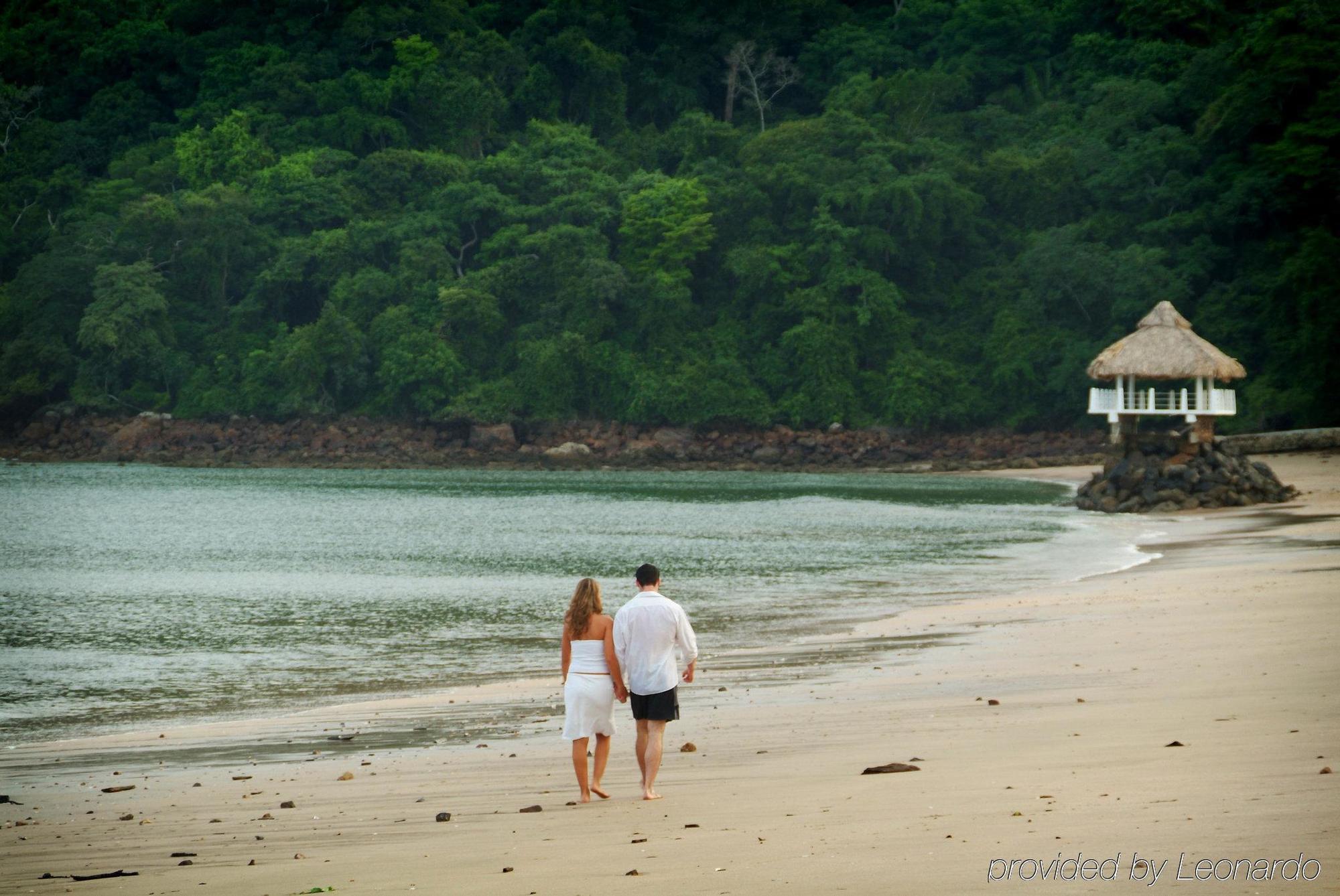 Dreams Playa Bonita All Inclusive Panama City Facilities photo A couple walking on the beach at Daydream Island Resort